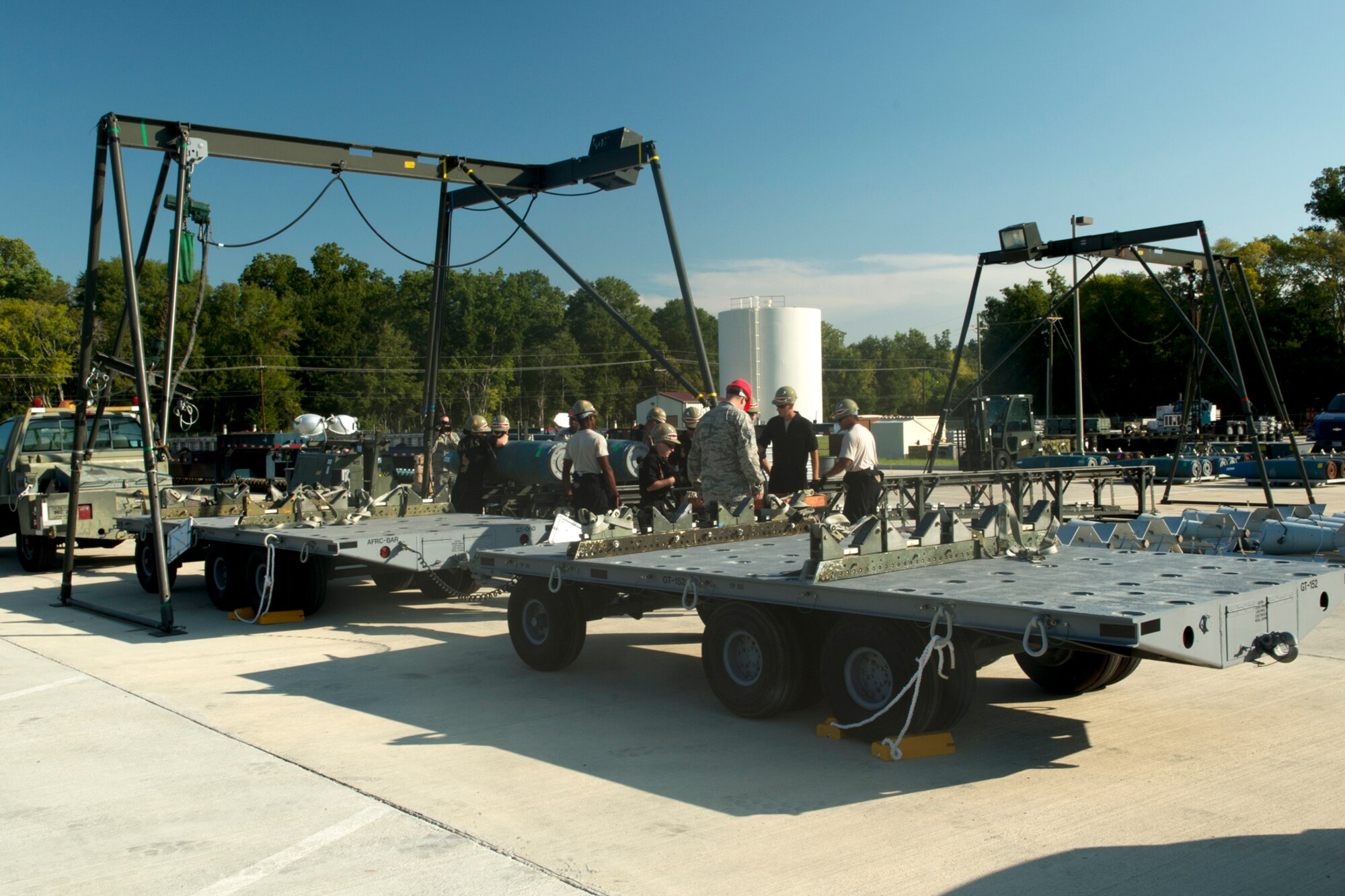 Munitions technicians assigned to the 307th Maintenance Squadron assemble 2000 pound Joint Direct Attack Munitions during competition for the Global Strike Challenge, Sept. 13, 2012, Barksdale Air Force Base, La. The challenge is the world's premier bomber, intercontinental ballistic missile and security forces competition with units participating from the Air Force Global Strike Command, Air Combat Command, Air Force Material Command, Air Force Reserve Command and the Air National Guard. (U.S. Air Force photo by Master Sgt. Greg Steele/Released)