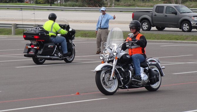Patrick Air Force Base motorcycle riders take the motorcycle safety course in the commissary parking lot.  The course is required for military members who operate a motorcycle on the base.