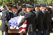 Pallbearers from U.S. Army North’s Military Honors Platoon move the casket from the caisson to the bier during the interment of retired Lt. Gen. Johnny Johnston Sept. 10 at the Fort Sam Houston National Cemetery. (Photo by Staff Sgt. Keith Anderson, U.S. Army North Public Affairs)