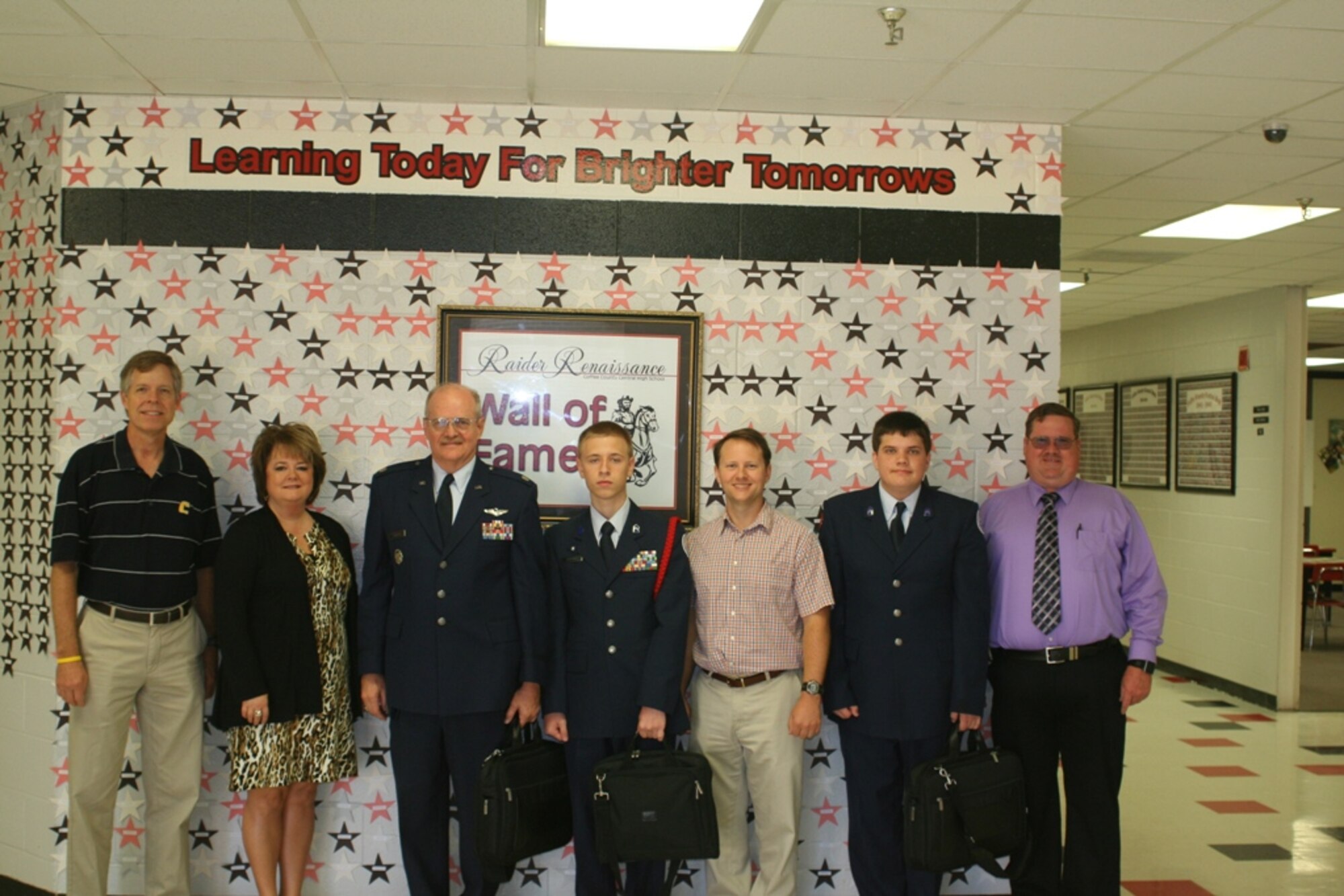 Representatives from Arnold Engineering Development Complex’s (AEDC) Science, Technology, Engineering and Mathematics (STEM) center recently loaned CyberPatriot V laptops to the Coffee County Central High School (CCCHS) Air Force Junior ROTC (AFJROTC) CyberPatriot V team. Pictured left to right is Jere Matty, AEDC STEM Educational Outreach Specialist; Angela Gribble, CCCHS vice principal; Lt. Col. Philip Bailey, CCCHS AFJROTC Senior Aerospace Science Instructor; Cadet Maj. Kevin Kaufman, CCCHS AFJROTC corps commander, Cameron Liner, AEDC CyberPatriot V mentor; Cadet 1st Lt. Billy Nippers, CCCHS AFJROTC deputy corps commander; and Michael Glennon, AEDC CyberPatriot V Mentor. (photo provided)