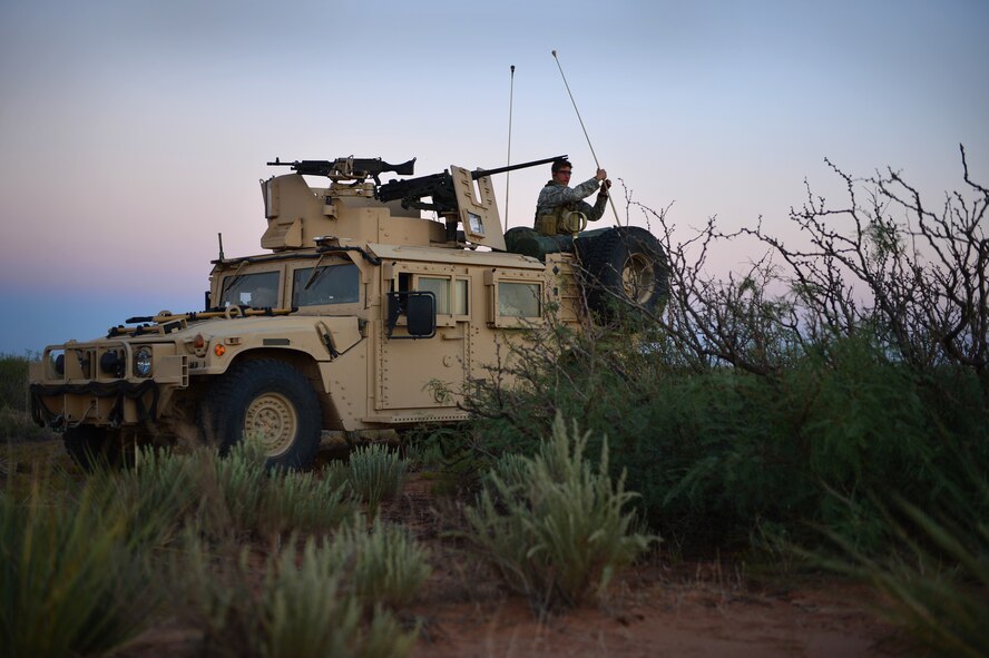 A soldier with the 19th Special Forces Group adjusts an antenna on a Humvee during a training mission at Melrose Air Force Range, N.M., Sept. 19, 2012. Melrose has been an integral part of Cannon Air Force Base, N.M., since the early 1950s. (U.S. Air Force photo/Airman 1st Class Eboni Reece)