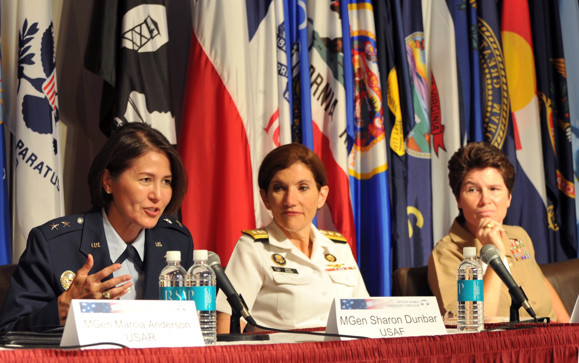 Air Force District of Washington Commander Maj. Gen. Sharon K.G. Dunbar (left) speaks during a flag-officer panel at the 9th annual Officer Women Leadership Symposium Sept. 22, 2012, at the Women in Military Service for America Memorial, Arlington, Va. Also participating on the panel were U.S. Cyber Command Chief of Staff, Rear Adm. Margaret Deluca Klein (center) and Marine Recruit Depot Parris Island Commanding General, Brig. Gen. Lori E. Reynolds (right). AcademyWomen sponsored the two-day event designed to inspire, inform and connect current, future and former women military officers from all the military services regardless of commissioning source. (U.S. Air Force photo by 1st Lt. Ashleigh Peck)