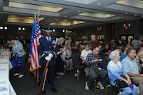 Joint Base San Antonio-Randolph Honor Guard members prepare to post the colors during the retiree appreciation event held at Joint Base San Antonio-Randolph, Texas, Sept. 22. The event is held annually at the Kendrick Club to educate the local retiree community on services available to them. 
(U.S. Air Force photo by Rich McFadden) 
