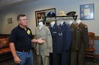 Anton Gerard, Retiree Affairs Office volunteer, explains his historic uniform display during the Retiree Appreciation Day event held at Joint Base San Antonio-Randolph, Texas, Sept. 22. The event is held annually at the Kendrick Club to educate the local retiree community on services available to them. (U.S. Air Force photo by Rich McFadden) 