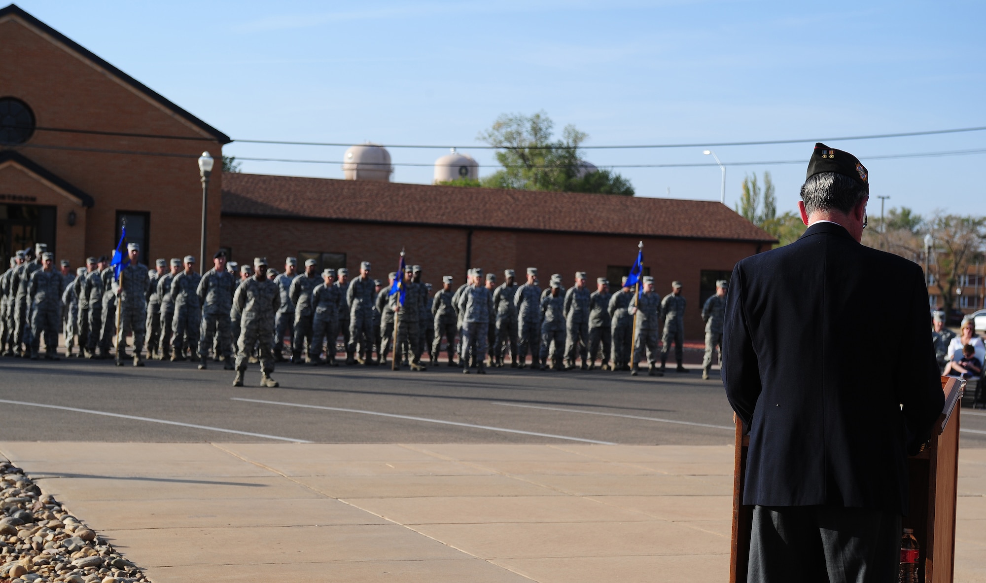 Vernon Luce, State Commander of the New Mexico Veterans of Foreign Wars, addresses the crowd at the Prisoner of War/Missing in Action Ceremony at Cannon Air Force Base, N.M., Sept. 21, 2012. The ceremony was held in honor of those service members who have fallen into enemy hands or  have never been recovered. (U.S. Air Force photo by Airman 1st Class Ericka Engblom)