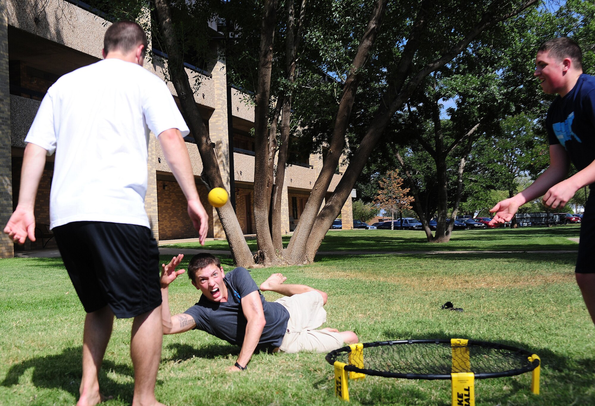 A group of Airmen play a game at Cannon Air Force Base, N.M., Sept. 22, 2012. The Clovis community sponsored a Swarm the Dorms party to show the community’s gratitude toward the base. (U.S. Air Force photo/Airman 1st Class Ericka Engblom)