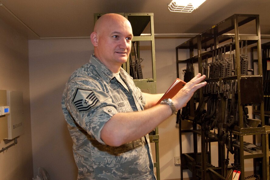 Master Sgt. Brian Hobbs, 124th Fighter Wing Weapons Safety Specials, shows weapons storage containers to inspectors Sept. 19 at Gowen Field. The Environmental Safety Occupational Health Compliance Assessment Management Program, which assesses work centers throughout the 124th Fighter Wing, began Sept. 17 and lasts through Sept. 21. (U.S. Air Force photo by Tech. Sgt. Becky Vanshur)
