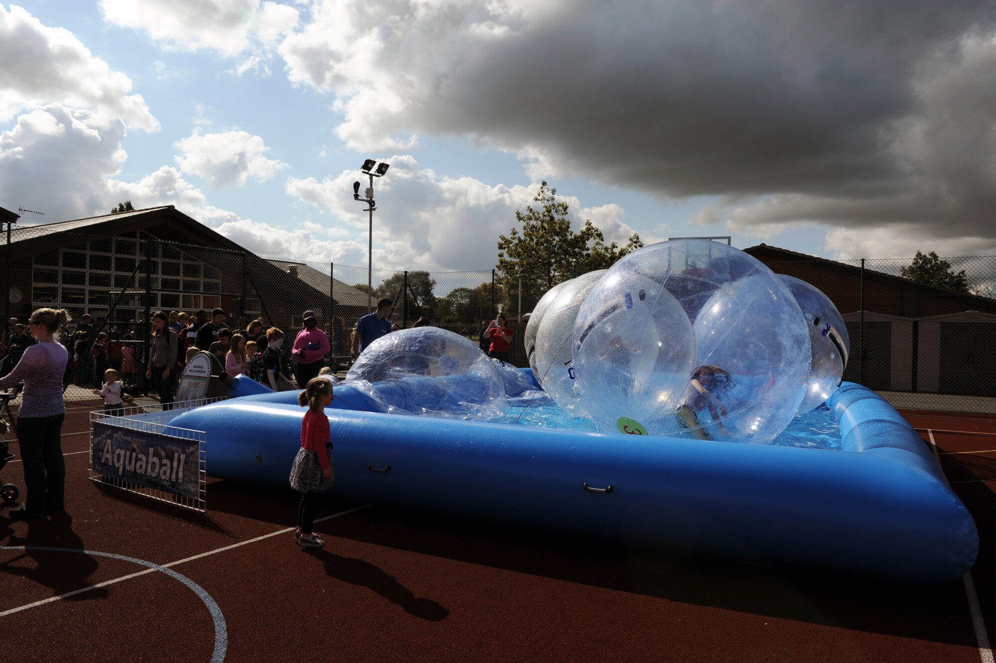 AF MILDENHALL, England -- Children enjoy the aquaballs pit during the Worldwide Day of Play held at the RAF Mildenhall Youth Center Sept. 22, 2012. More than 900 people attended the Worldwide Day of Play which featured games, bouncy castles, Pets as Therapy dogs, go-karts and more. (U.S. Air Force photo/Tech. Sgt. Stacia Zachary)