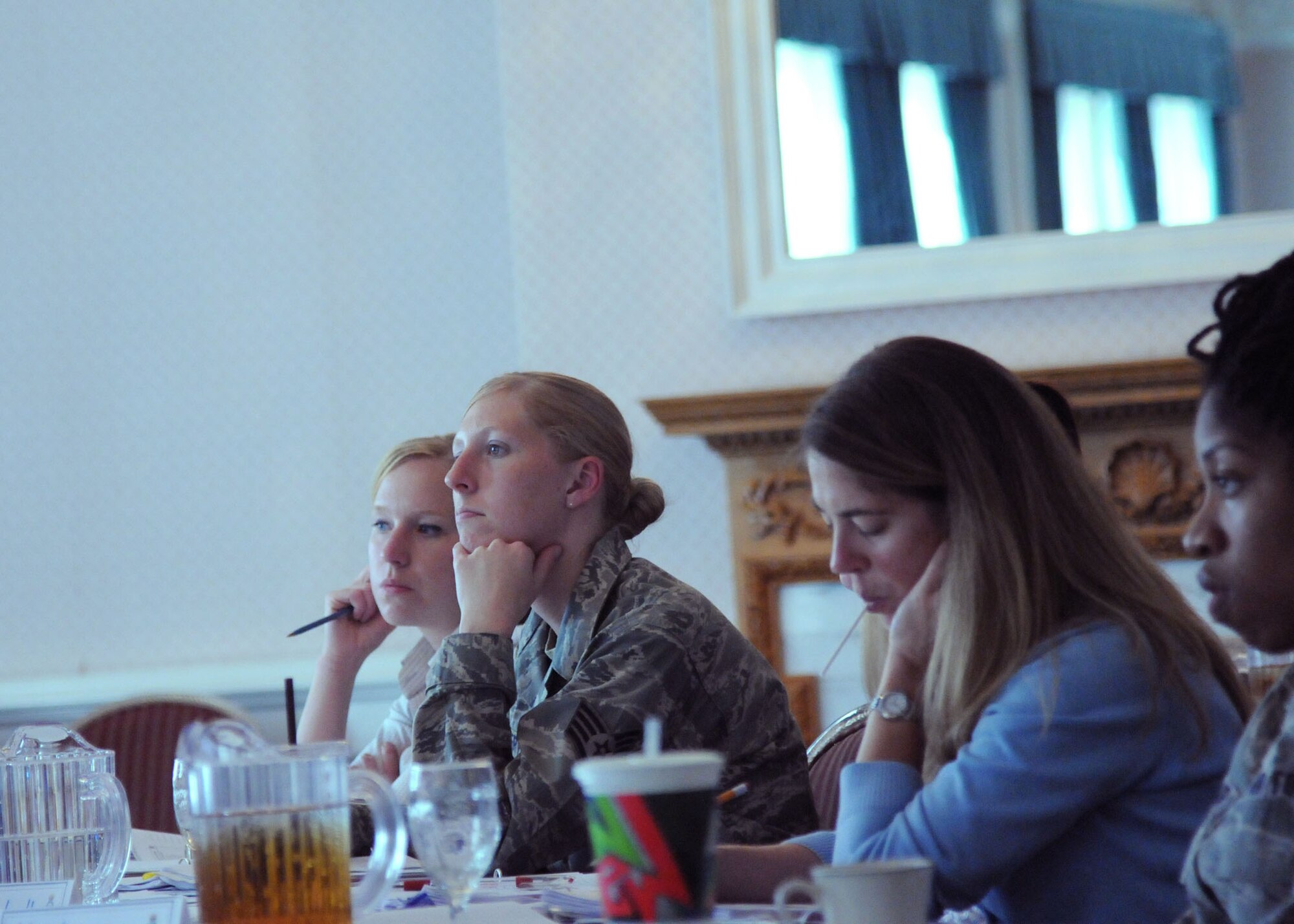 RAF Mildenhall, England- Students take notes during a protocol workshop at Middleton Hall, Sept. 19 2012 at RAF Mildenhall. The week-long workshop was open to Service members as well as civilians. (U.S. Air Force photo/Airman 1st Class Kelsey Waters) 