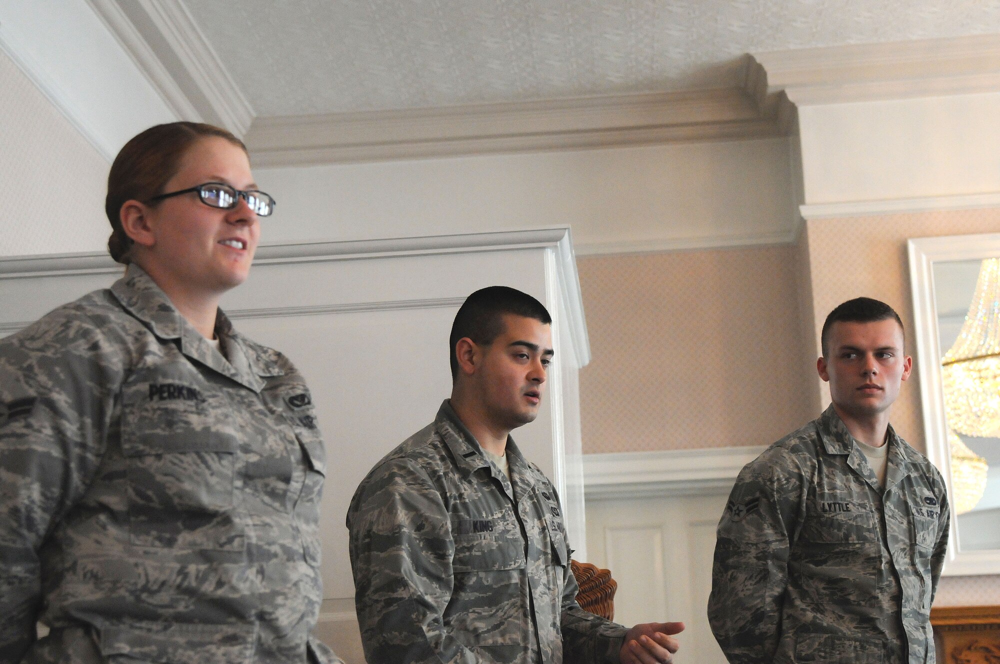 RAF Mildenhall, England –From left, Airman First Class Hillary Perkins, 100th Operations Support Squadron, 1st Lt Matthew King, 100th OSS, Airman 1st Class, 100th Maintenance  Squadron, all members of the RAF Mildenhall Honor Guard introduce themselves as they sit in on the flag protocol portion of a protocol workshop at Middleton Hall, Sept. 19 2012 at RAF Mildenhall. The protocol workshop was a week-long and discussed protocol for every situation. (U.S. Air Force photo/Airman 1st Class Kelsey Waters) 

