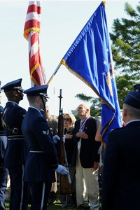 Jim Ashley, World War II prisoner of war, places his hand over his heart through the colors presentation during the POW-MIA ceremony at Langley Air Force Base, Va., Sept. 21, 2012. The U.S. Congress passed a resolution, July 18, 1979, authorizing official observation of National POW-MIA Recognition Day. (U.S. Air Force photo by Senior Airman Racheal Watson/Released)