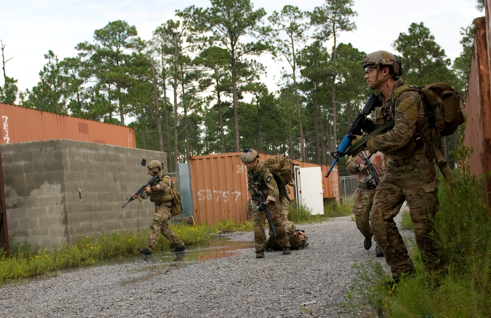 U.S. Air Force pararescuemen from 23rd Special Tactics Squadron drag a simulated combat casualty on a litter during a tactical readiness training exercise on Eglin Range, Fla., Aug. 21, 2012. The pararescuemen performed several exercises to meet training requirements to become tactical readiness specialists.
(U.S. Air Force Photo/Staff Sgt. John Bainter)
