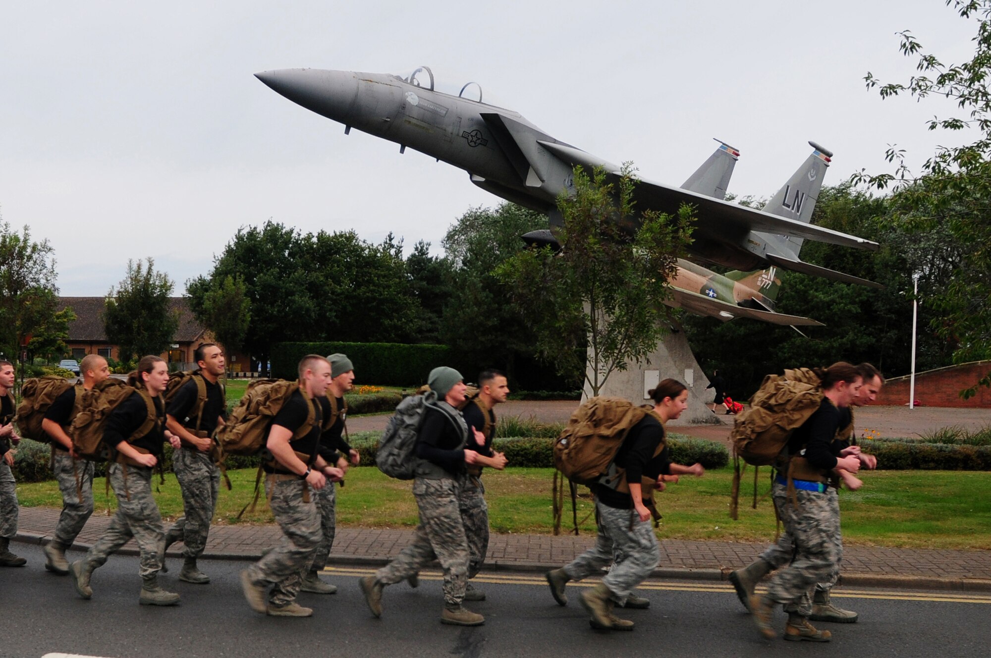 ROYAL AIR FORCE LAKENHEATH, England – Airmen from the 48th Security Forces Squadron particpates in the POW/MIA ruck march Sept. 21, 2012. The theme of this year’s POW/MIA Remembrance week is “Never Forgotten,” referring to the hardships and sacrifices former POWs made and serving as a reminder of those who are still missing. (U.S. Air Force photo by Airman 1st Class Cory D. Payne)