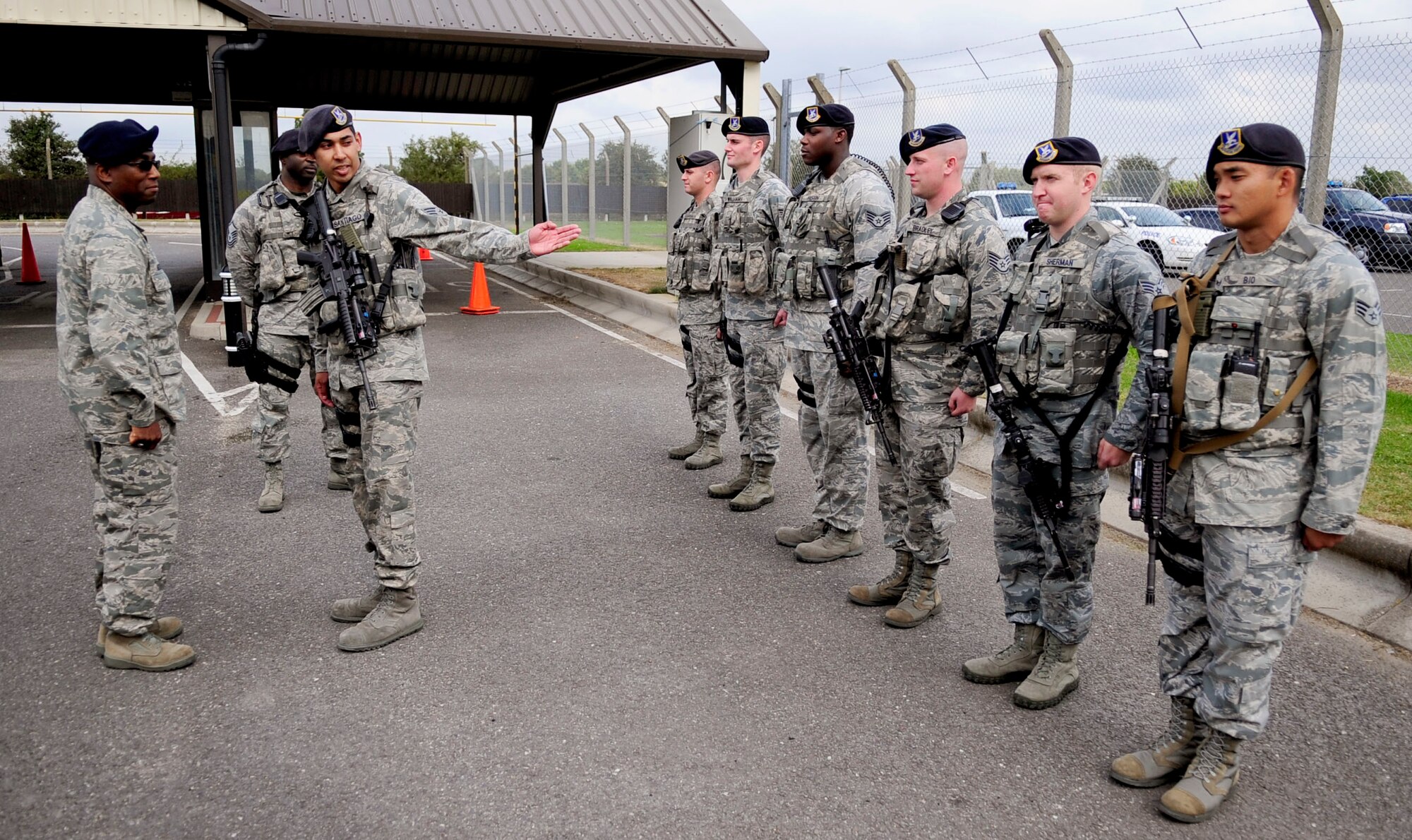 RAF MILDENHALL, England – Senior Airman Gabriel Santiago, 100th Security Forces Squadron response force member, acknowledges the rest of his flight while giving Brig. Gen. Allen Jamerson, Director of Security Forces, Deputy Chief of Staff for Logistics, Installations and Mission Support, Headquarters U.S. Air Force, a post brief during a site visit Sept. 21, 2012, at RAF Mildenhall. The visit was Jamerson’s first initial visit to RAF Mildenhall after recently taking command. (U.S. Air Force photo/Senior Airman Ethan Morgan)