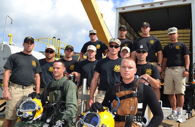 Army divers from the 86th Engineer Dive Detachment at the Army Corps’ Marine Terminal Facility at Caven Point, New Jersey.  
