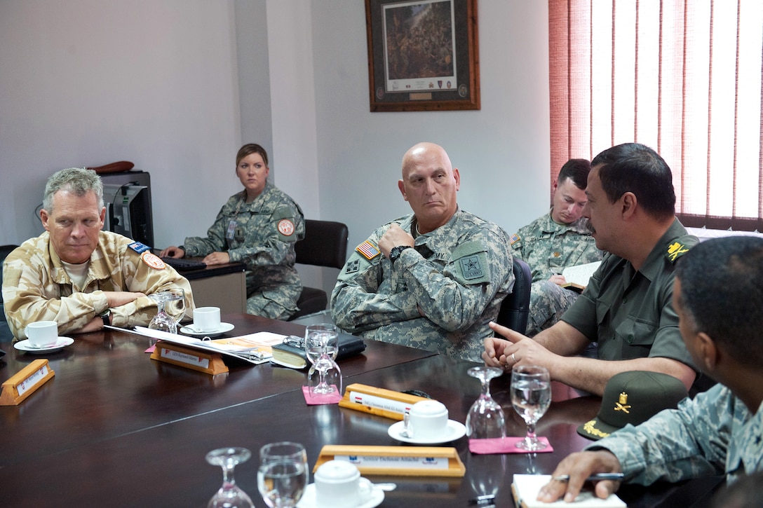 U.S. Army Chief of Staff Gen. Ray Odierno, center, recieves an update brief on current operations in the Sinai Peninsula by New Zealand army Maj. Gen. Warren J. Whiting, left, and Egyptian army Maj. Gen. Ossama Abdel Aziz, right, on South Camp near Sharm el Sheikh, Egypt, Sept. 21, 2012. Whiting is the commanding general of the Multinational Force and Observers, and Aziz is the general officer Chief of Liaison Agency with International Organizations.