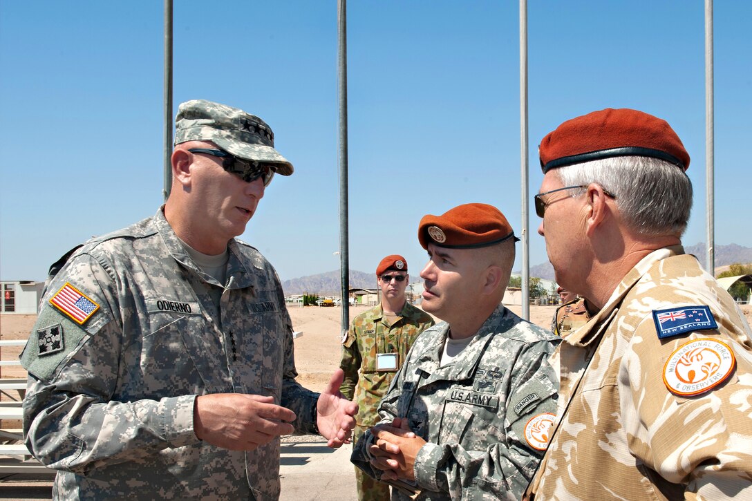 U.S. Army Chief of Staff Gen. Ray Odierno talks with New Zealand army Maj. Gen. Warren J. Whiting, right, and U.S. Army Col. Robert Haycock, center, during his on South Camp near Sharm el Sheikh, Egypt in the southern tip of the Sinai Peninsula, Sept. 21, 2012. Whiting is the commanding general of the Multinational Force and Observers, Haycock is the deputy commander of the MFO and commander of the U.S. Army Task Force Sinai.