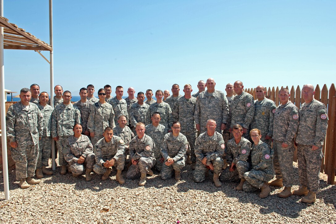 U.S. Army Chief of Staff Gen. Ray Odierno poses for a group photo with soldiers on South Camp near Sharm el Sheikh, Egypt, Sept. 21, 2012.