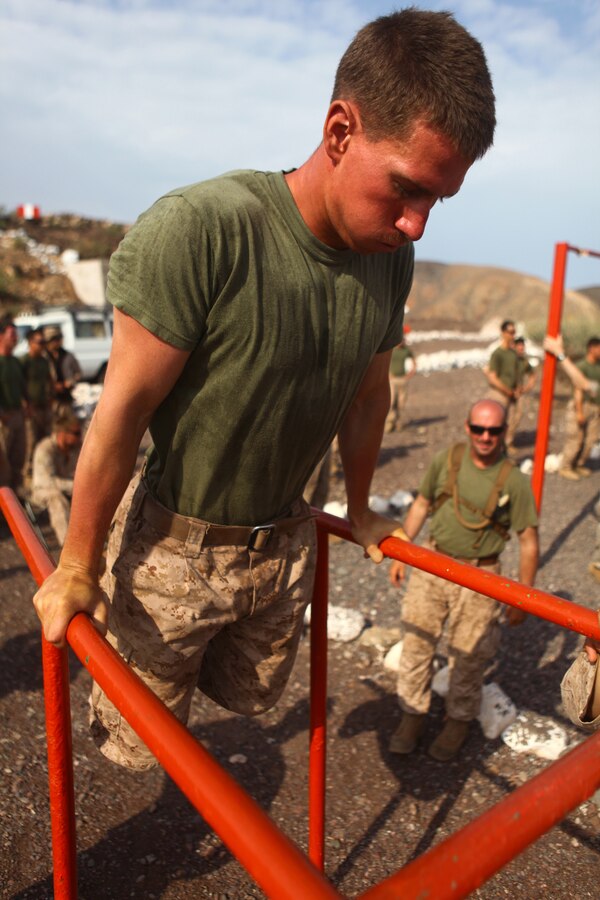 Lance Cpl. Arthur Yencho a South Jersey native and rifleman with 1st Platoon, Bravo Company, Battalion Landing Team 1st Battalion, 2nd Marine Regiment, 24th Marine Expeditionary Unit, performs bar dips while competing in the Training Force Challenge, Sep. 16, 2012. The competition was the culmination of a three-week training package in Djibouti focused on the application of infantry skills in rugged mountain terrain. The 24th MEU is deployed with the Iwo Jima Amphibious Ready Group as a theater reserve and crisis response force throughout U.S. Central Command and the Navy's 5th Fleet area of responsibility.