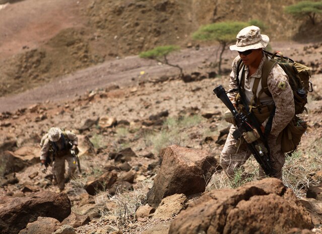 Marines with Bravo Company, Battalion Landing Team 1st Battalion, 2nd Marine Regiment, 24th Marine Expeditionary Unit, pause after descending a mountain during a force-on-force training exercise in Djibouti, Sep. 4, 2012. The exercise is part of a 24th MEU Training Force, or "T-Force" package focused on the application of infantry skills in rugged mountain terrain. The 24th MEU is deployed with the Iwo Jima Amphibious Ready Group as a theater reserve and crisis response force throughout U.S. Central Command and the Navy's 5th Fleet area of responsibility.