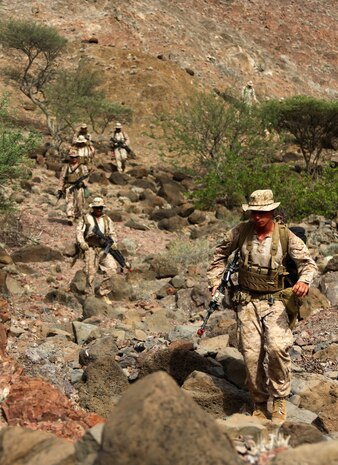 Marines with Bravo Company, Battalion Landing Team 1st Battalion, 2nd Marine Regiment, 24th Marine Expeditionary Unit, descend a 1600 ft. mountain while on a foot patrol during a force-on-force training exercise in Djibouti, Sep. 4, 2012. The exercise is part of a 24th MEU Training Force, or "T-Force" package focused on the application of infantry skills in rugged mountain terrain. The 24th MEU is deployed with the Iwo Jima Amphibious Ready Group as a theater reserve and crisis response force throughout U.S. Central Command and the Navy's 5th Fleet area of responsibility.