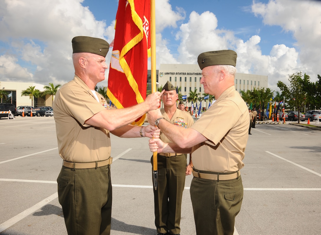 Maj. Gen. John M. Croley (right) relinquished command of MARFORSOUTH to Brig. Gen. W. “Blake” Crowe (left) during a ceremony at the U.S. Southern Command headquarters Sept. 20.  MARFORSOUTH is the U. S. Marine Corps Service Component Command for U. S. Southern Command.  MARFORSOUTH commands all Marine forces assigned to Commander SOUTHCOM; advises the Commander SOUTHCOM on the proper employment and support of Marine forces; conducts deployment and redeployment planning and execution of assigned, attached Marine forces, and accomplishes other operational missions as assigned.  (Official Department of Defense photo by Juan Chiari//Released)