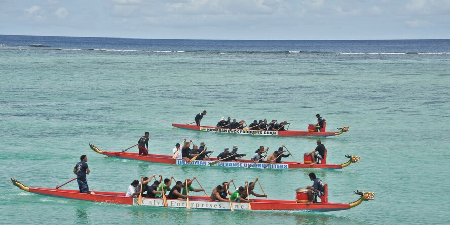 TAMUNING, Guam—Andersen Air Force Base Fire Department Airman paddle out to the starting line during the first heat at the 2012 Second Annual 9/11 Commemorative Dragon Boat Race at Matapang Beach, Sept. 22. This year’s boat Race had 10 person teams including the Guam Police Department, Andersen and deployed-in Kadena AFB Fire Department Airman, Guam Fire Department, Guam National Guard, Naval Fire Department, Navy Tag Five and the Haggan Outrigger Canoe Club. The dragon boat race consisted of eight separate heats competing for time, with the Guam Police Department taking the overall win with 2:12.63 seconds. (U.S. Air Force photo by Staff Sgt. Alexandre Montes/Released)