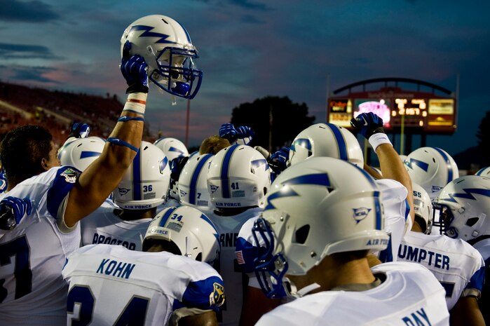 U.S. Air Force Academy Falcons football players get in a huddle before the game against the University of Nevada, Las Vegas Rebels Sept. 22, 2012, at Same Boyd Stadium in Las Vegas, Nev. The Falcons have 9 more games in the 2012 season. (U.S. Air Force photo by Senior Airman Daniel Hughes)