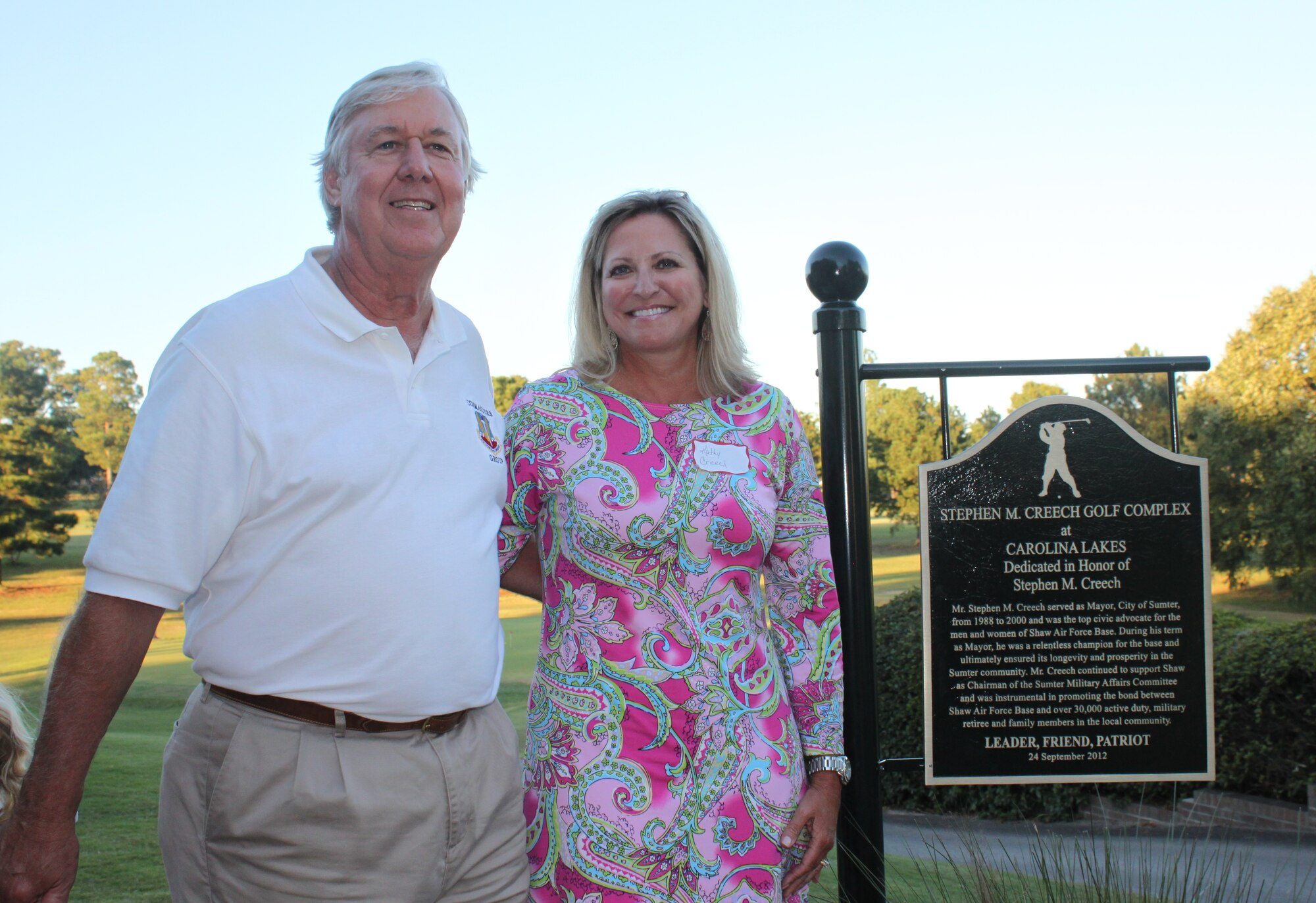 Stephen M. Creech, Sumter Chamber of Commerce Military Affairs chairman and wife Kathy Creech, pose for a photo in front of a dedication plaque that was unveiled for Creech at Carolina Lakes, Shaw Air Force Base, S.C., Sept. 24, 2012. Creech is a former City of Sumter Mayor and long time military supporter. Creech’s family and several local civic leaders attended the dedication ceremony. (U.S. Air Force photo by 1st Lt. Ann Blodzinski/Released)  