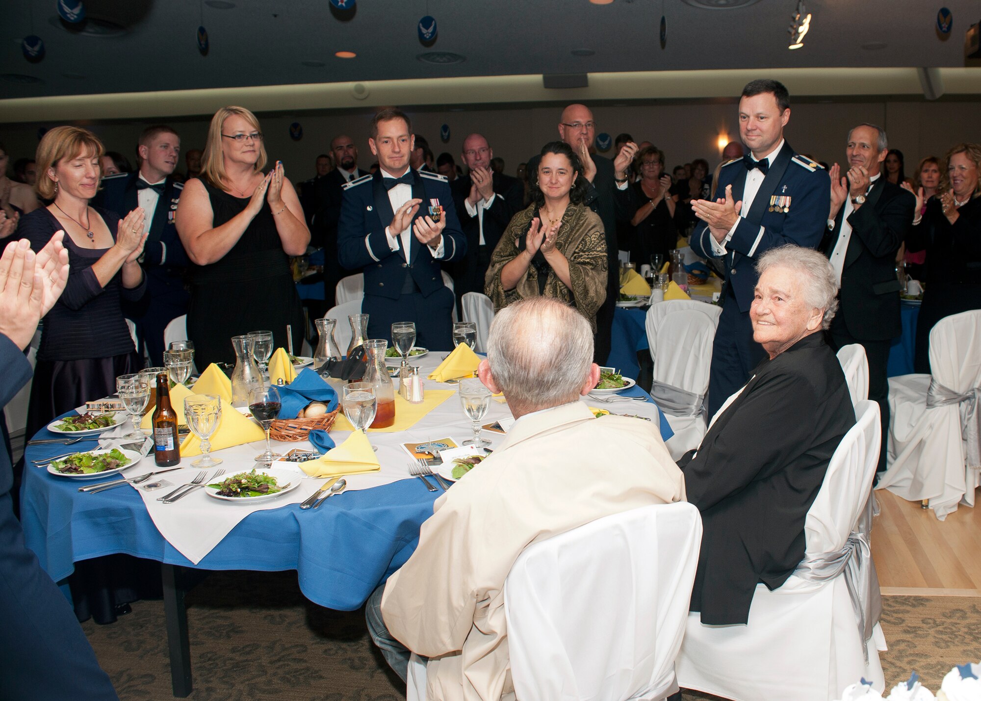Team Edwards members stand for toasts made during the Air Force Ball at Edwards Sept. 21 at Club Muroc. (U.S. Air Force photo by Ethan Wagner)