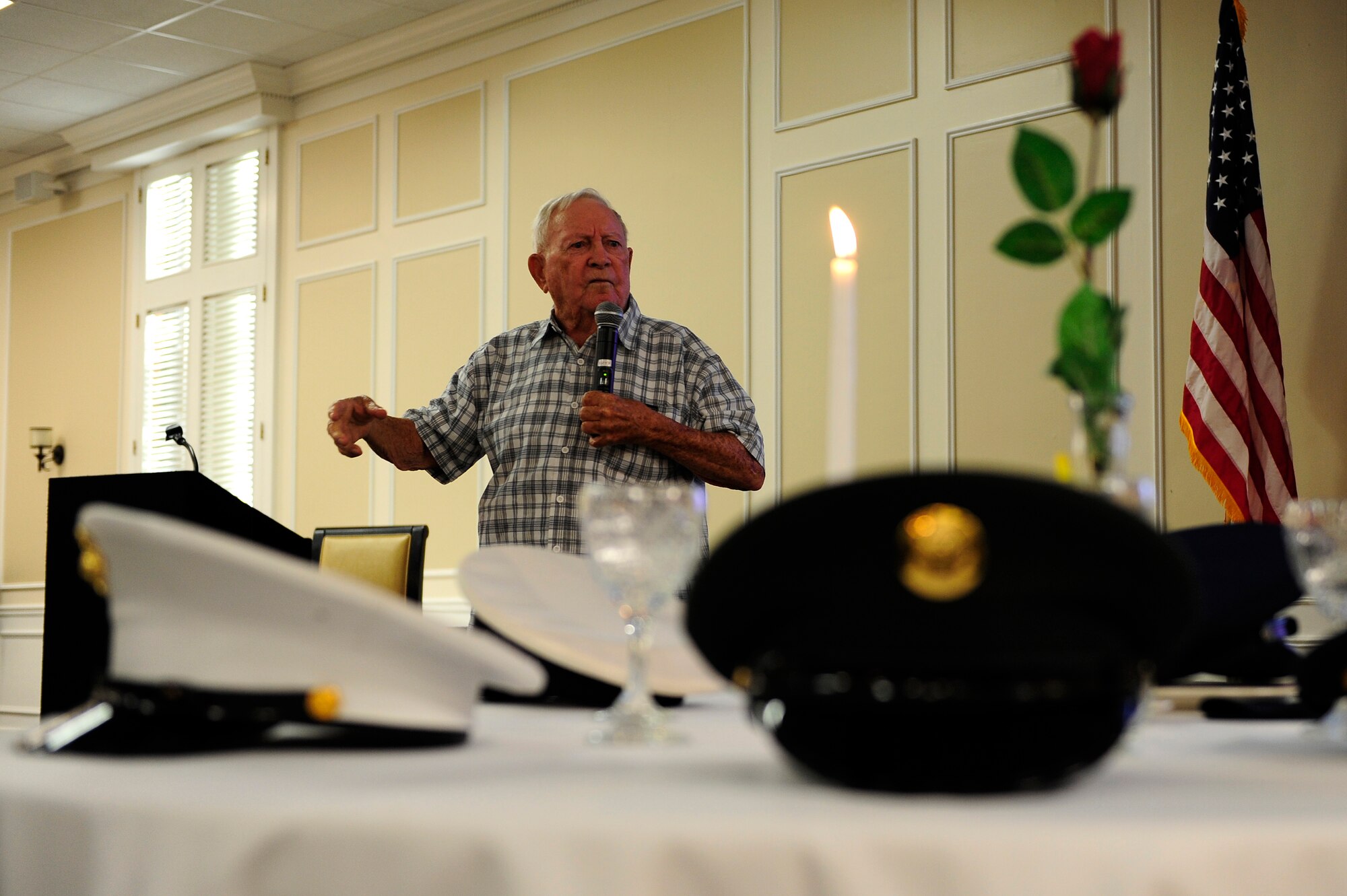 Guest speaker, and former prisoner of war retired Senior Master Sgt. Kenneth Duffy, speaks at a POW/MIA breakfast held at Shaw Air Force Base, S.C., Sept. 20, 2012. Duffy shared his experience as a POW with first-term and prior-enlisted Airmen, hoping to inspire and encourage them to push through hard times. (U.S. Air Force photo by Airman 1st Class Daniel Blackwell/Released)