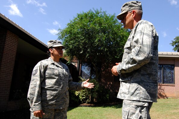 U.S. Air Force Tech. Sgt. Sandra Alvor-Thrash, 20th Fighter Wing Chaplain 
NCOIC of training and readiness, talks to Maj. David Knight, 20th Fighter Wing chaplain at Shaw Air Force Base, S.C., Sept. 25, 2012. Thrash is the Shaw Spotlight for the week of Sept. 24 to Sept. 28. (U.S. Air Force photo by Airman 1st Class Ashley L. Gardner/ Released)
	
