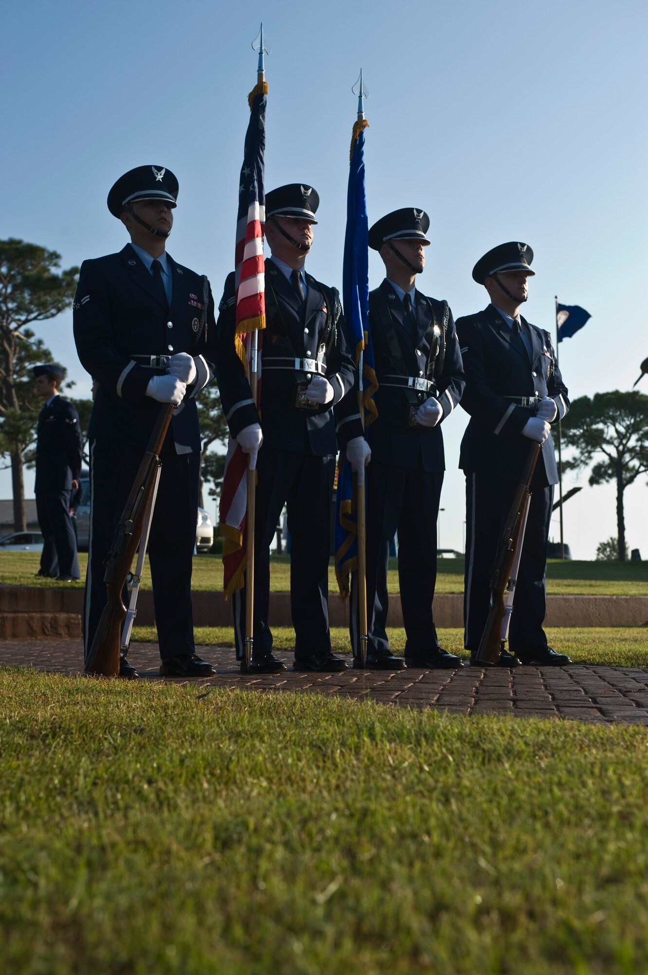 Members of the Hurlburt Field Honor Guard prepare to post the colors during a Prisoner of War and Missing in Action recognition ceremony at the Airpark at Hurlburt Field, Fla., Sept. 21, 2012. More than 50 Air Commandos attended the event to honor the service and sacrifices of captured and missing service members. (U.S. Air Force Photo/Airman 1st Class Hayden K. Hyatt)