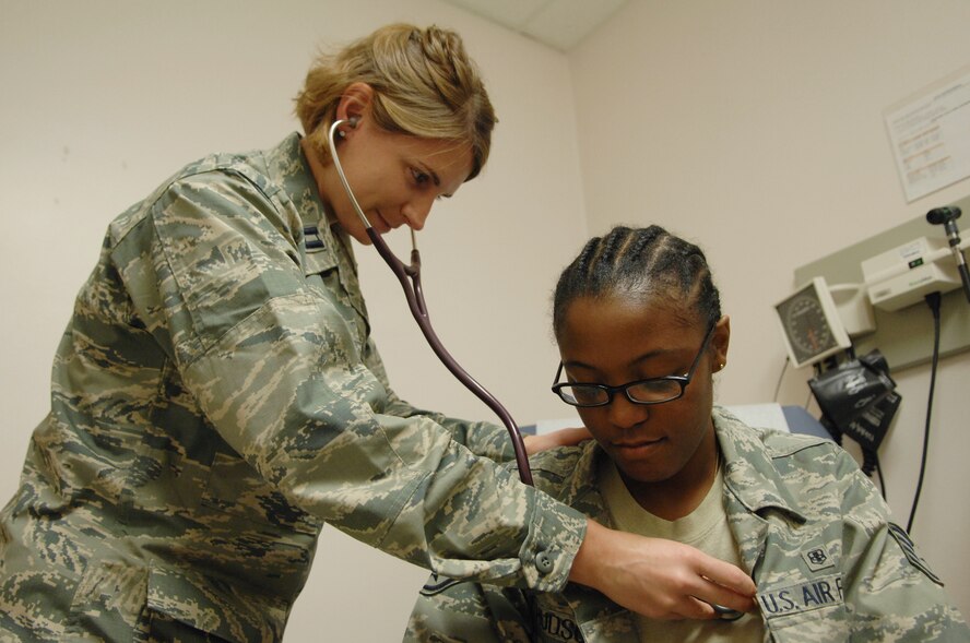 U.S. Air Force Capt. Lindsey Goetz, 20th Medical Operations Squadron family physician listens to the heary of Staff Sgt. Althia Hudson, 20th MDOS medical technician at Shaw Air Force Base, S.C., Sept. 25, 2012. Seven new Family Health providers and two new Pedicatric providers have arrived at the 20th MDOS.(U.S. Air Force photo by Airman Nicole Sikorski/Released)