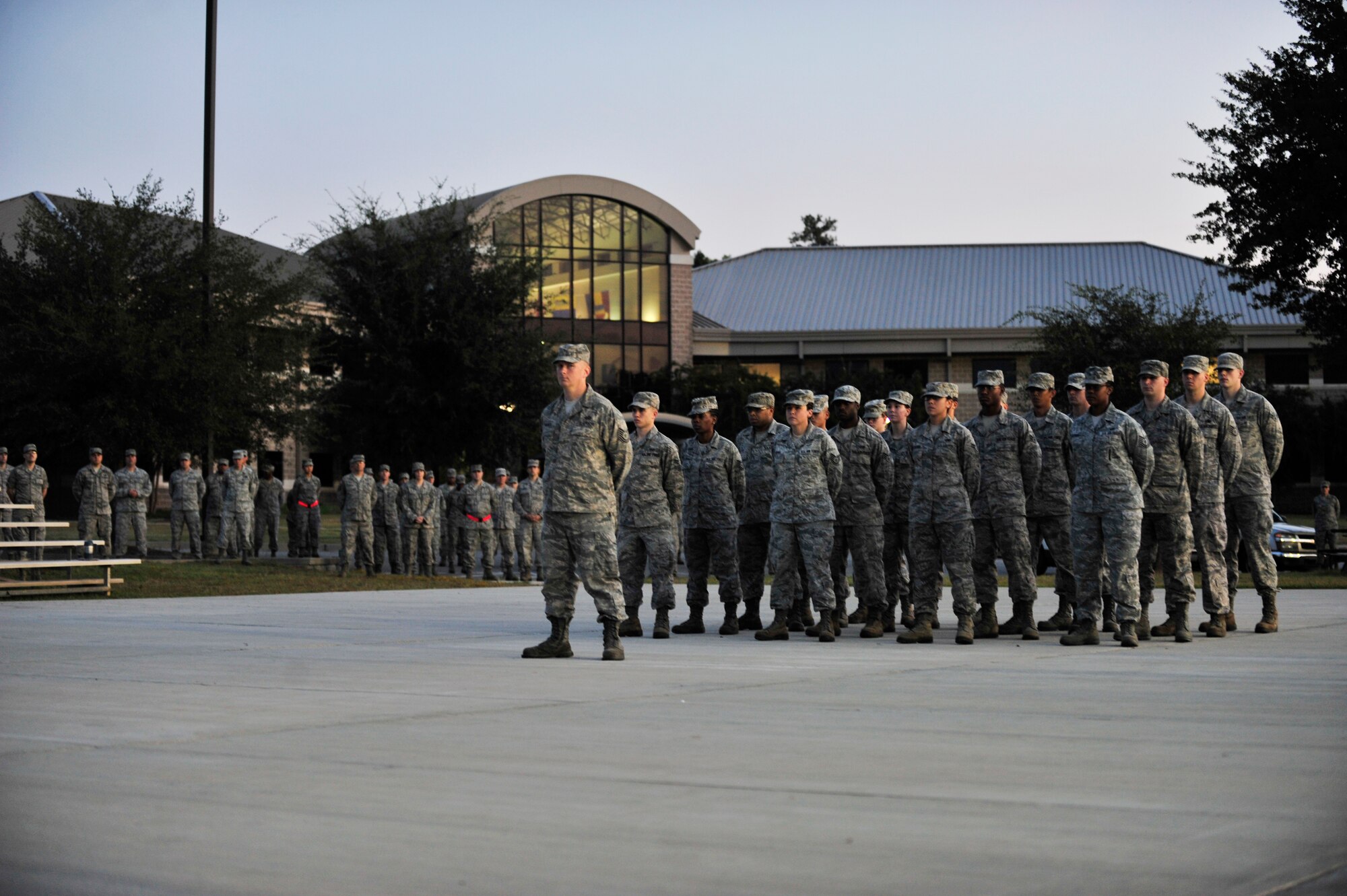 U.S. Air Force Airmen prepare for the closing ceremony at the end of the prisoner of war and missing in action recognition day at Shaw Air Force Base, S.C., Sept. 21, 2012.  Shaw Airmen ran for 24 hours to commemorate those lost at war. (U.S. Air Force photo by Airman Nicole Sikorski/Released)