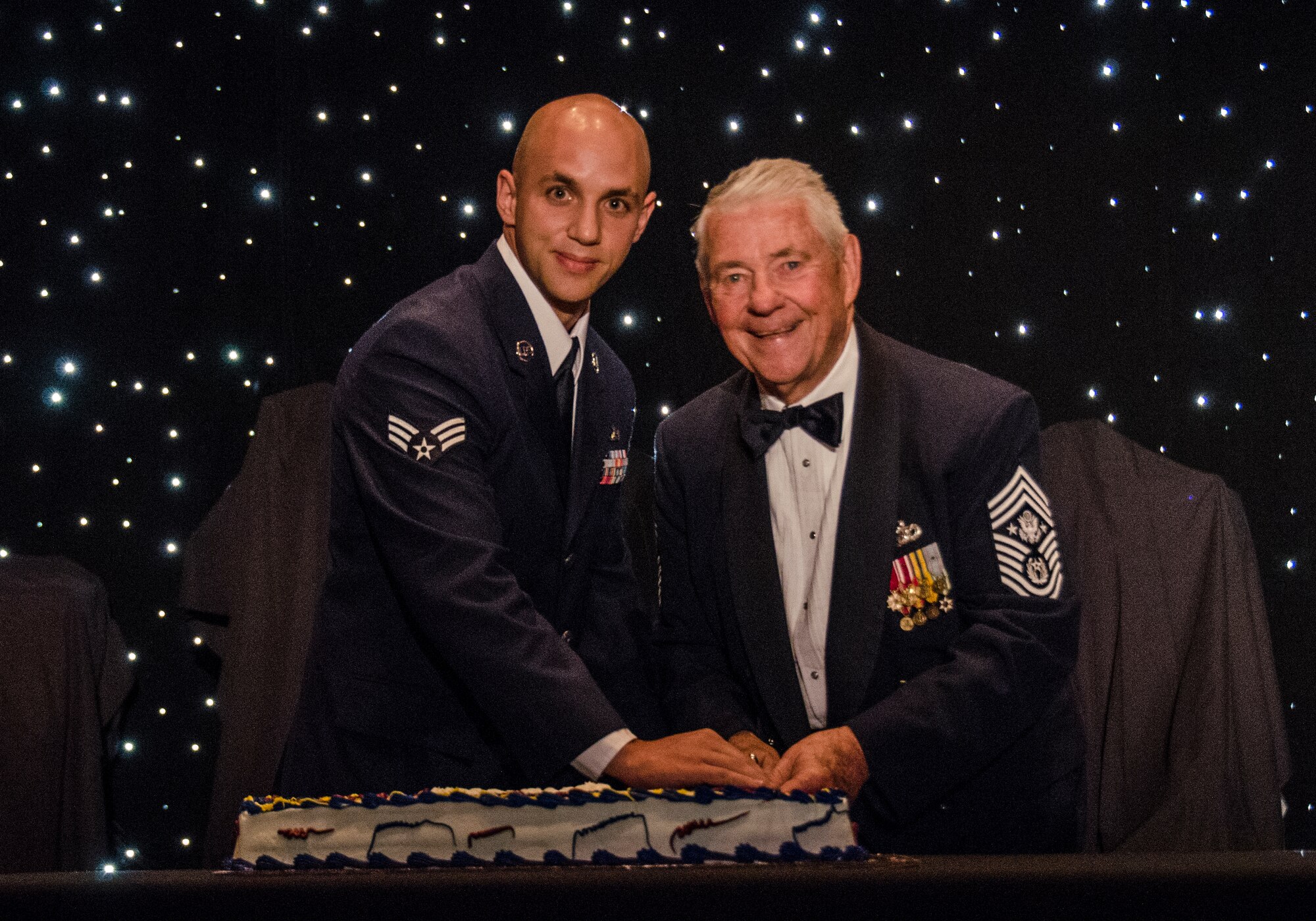 Retired Chief Master Sgt. Robert Gaylor, the fifth chief master sergeant of the Air Force, and Senior Airman Devon Brown, 437th Maintenance Squadron, ceremoniously cut the Air Force birthday cake Sept. 22, 2012, at the North Charleston Convention Center in North Charleston, S.C. (U.S. Air Force Photo / Airman 1st Class Tom Brading)