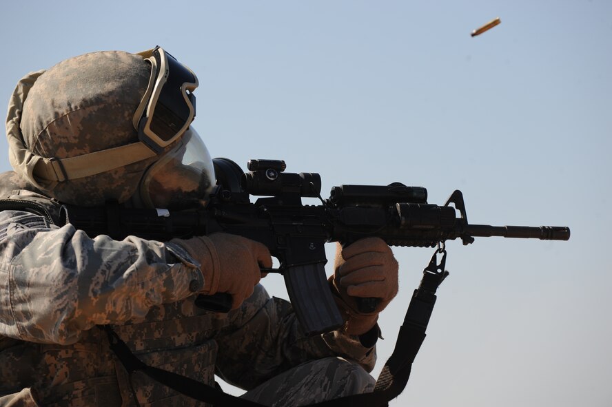 U.S. Air Force Tech. Sgt. Jenon McPhatter, 7th Security Forces Squadron, fires an M-4 while training for the 3rd annual Global Strike Challenge Sept. 20, 2012, at the Modified Record Fire Range, in Brownwood, Texas.  During the competition Dyess security forces will compete in marksmanship on the M-4, M-9, M-240 and M-230 weapons systems, combat tactics and priority resource defense, and the mental and physical challenge event. (U.S. Air Force photo by Airman 1st Class Jonathan Stefanko/ Released)