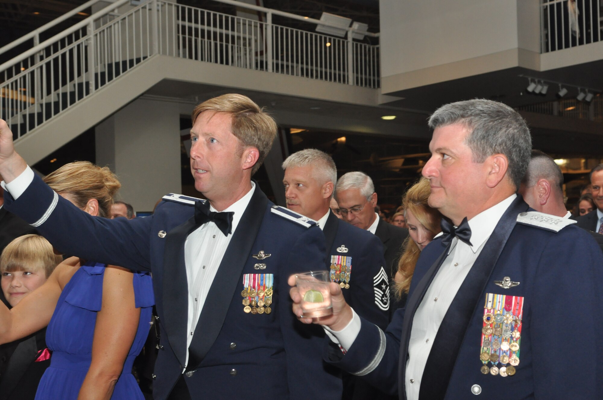Col. Wyn Elder (left), 62nd Airlift Wing commander and retired Lt. Gen. Rusty Findley, Air Mobility Command vice commander and guest speaker, toast their glasses during the opening ceremony at the McChord Field 2012 AF Ball, Sept. 21, 2012 at The Museum of Flight, Boeing Field, Seattle, Wash. Findley spoke of Air Mobility Command and the impact it has had on the past, present and future of the Air Force. (U.S. Air Force photo/Staff Sgt. Sean Tobin)