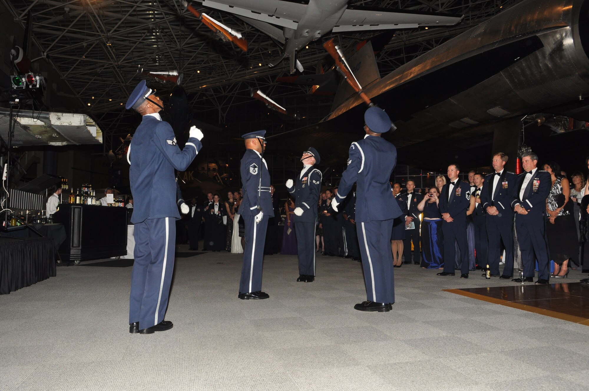 Members of the U.S. Air Force Honor Guard Drill Team conduct a performance at the McChord Field 2012 AF Ball, Sept. 21, 2012 at The Museum of Flight, Boeing Field, Seattle, Wash. More than 600 servicemembers, civilian leaders and spouses attended this year's event. (U.S. Air Force photo/Staff Sgt. Sean Tobin)