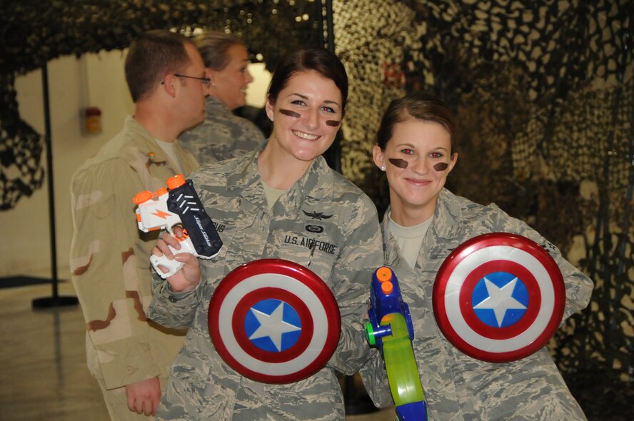 Airmen First Class Taylor Mainous and Tiffany Clark, both from the 124th Intelligence Squadron, are ready for battle at the Combat Dining In hosted by the 178th Fighter Wing Sept. 22. The event took place at the Springfield Air National Guard Base, Springfield,Ohio. (U.S Air Force photo by Senior Master Sgt. Joseph R. Stahl/Released)