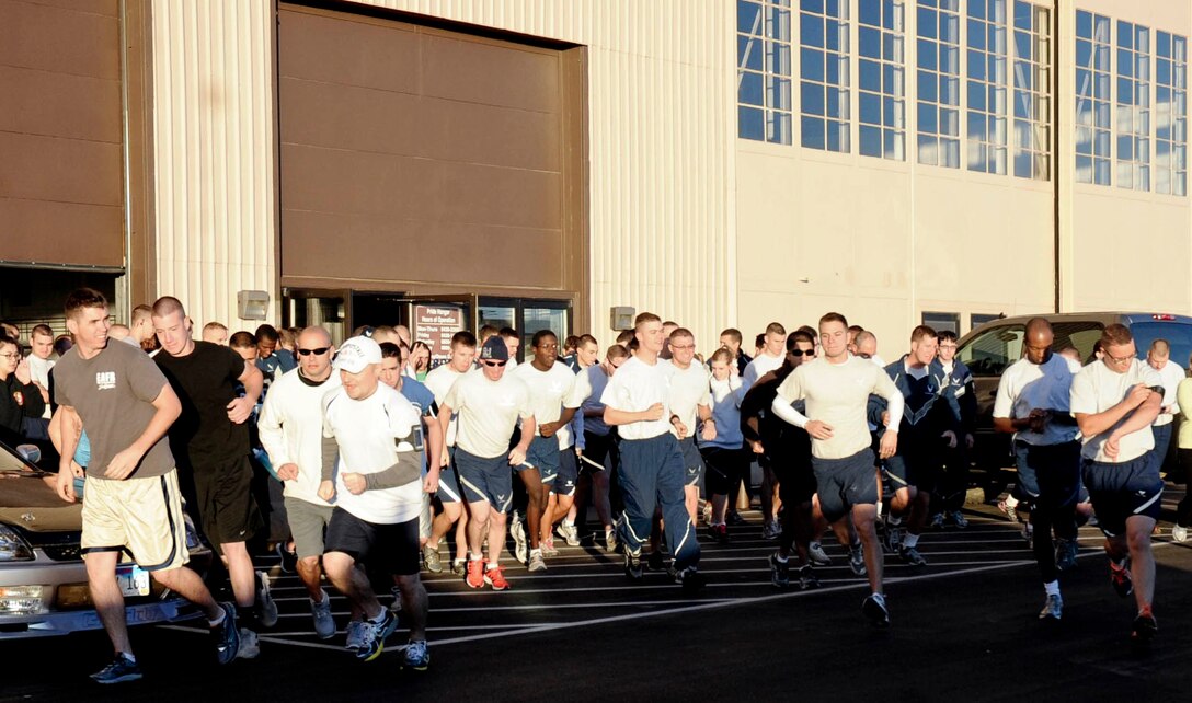 Ellsworth Airmen take off during a Prisoner of War – Missing In Action 5K run at Ellsworth Air Force Base, S.D., Sept. 21, 2012. Over one hundred participants ran to show support for the many patriots and families whom have made great sacrifices for our freedoms. (U.S. Air Force photo by Airman 1st Class Anania Tekurio/Released)