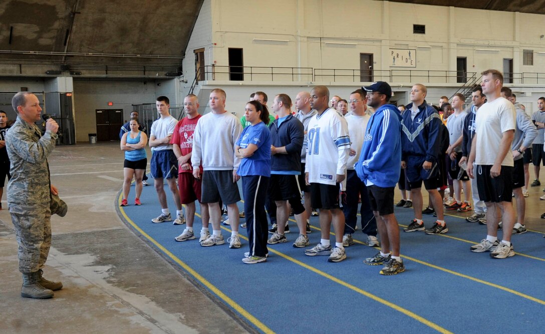 Col. Gentry Boswell, 28th Bomb Wing vice commander, addresses participants of the Prisoner Of War - Missing In Action 5k run at the Pride Hangar at Ellsworth Air Force Base, S.D., Sept. 21, 2012. As many as 150,000 Americans have been prisoners of war and more than 88,000 Americans are still listed as MIA from conflicts since World War II. (U.S. Air Force photo by Airman 1st Class Anania Tekurio/Released)