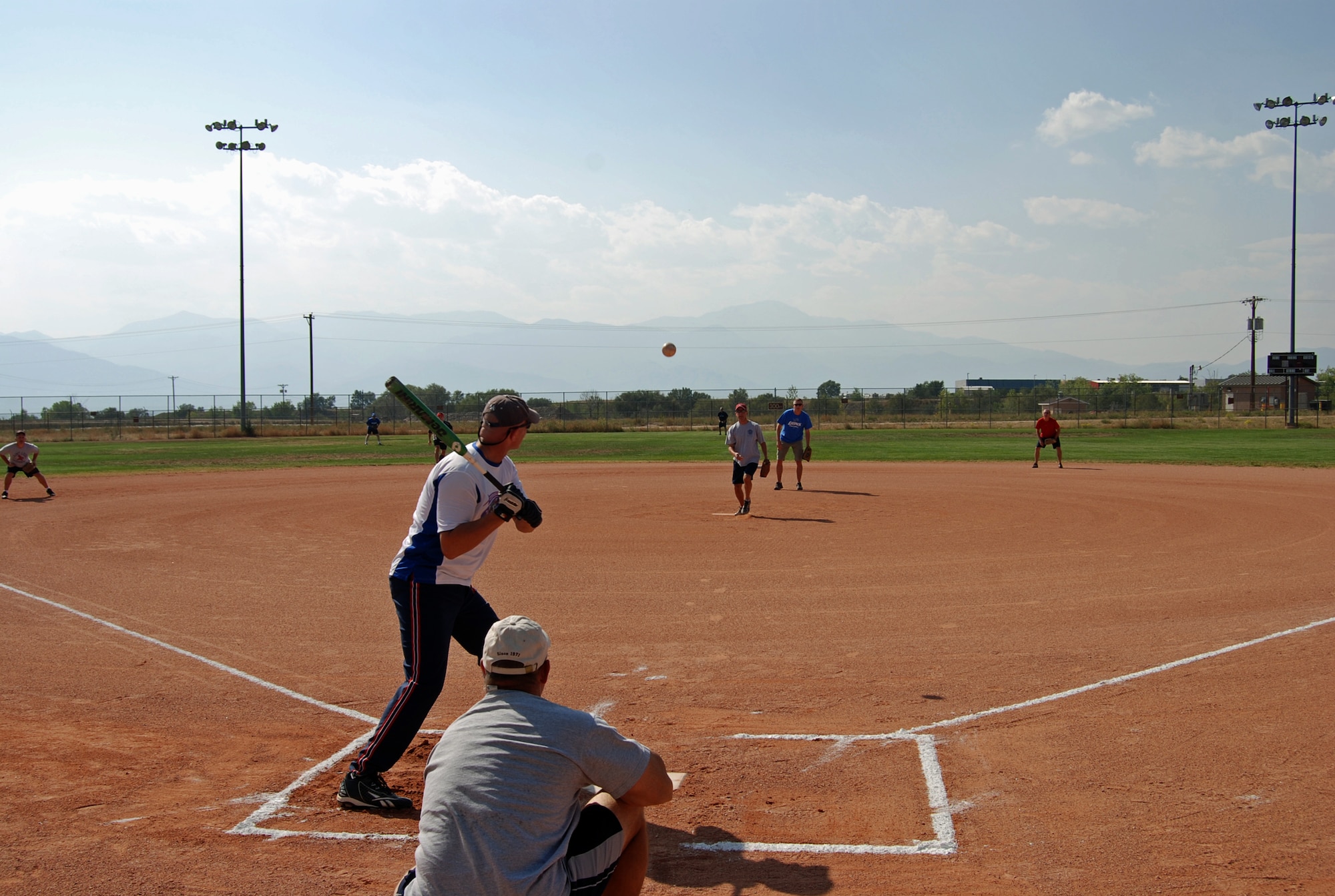 Chief Master Sgt. Richard Redman, 21st Space Wing command chief, pitches during the Chiefs versus Eagles softball game Sept. 20, 2012. The Chiefs went on to beat the Eagles 13-5. (U.S. Air Force photo/Lea Johnson)