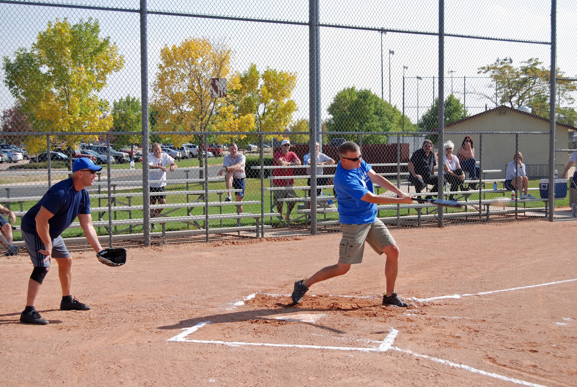Col. Jeffrey Flewelling, 21st Space Wing vice commander, advances runners during the Chiefs versus Eagles softball game Sept. 20, 2012. The Chiefs went on to beat the Eagles 13-5. (U.S. Air Force photo/Lea Johnson)