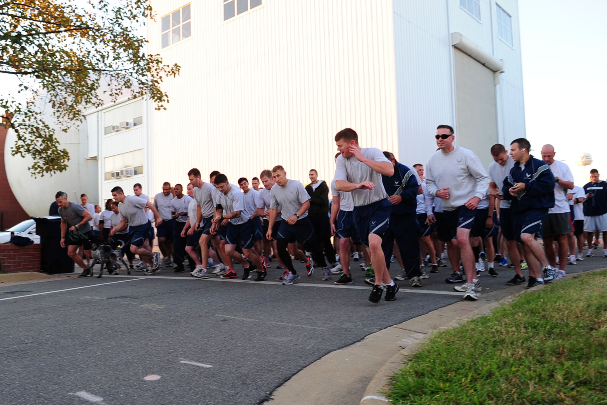 Volunteers begin running in the Combined Federal Campaign 5K run at Langley Air Force Base, Va., Sept. 25, 2012. The CFC is the world’s largest and most successful workplace charity campaign, raising millions of dollars between Sept. 1 and Dec. 15 each year. (U.S. Air Force photo by Staff Sgt. Ashley Hawkins/Released)
