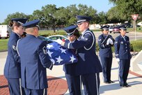 Members of Joint Base San Antonio-Randolph Honor Guard fold the flag during the  POW/MIA Recognition Day retreat ceremony Sept. 21. 
(U.S. Air Force photo by Melissa Peterson)