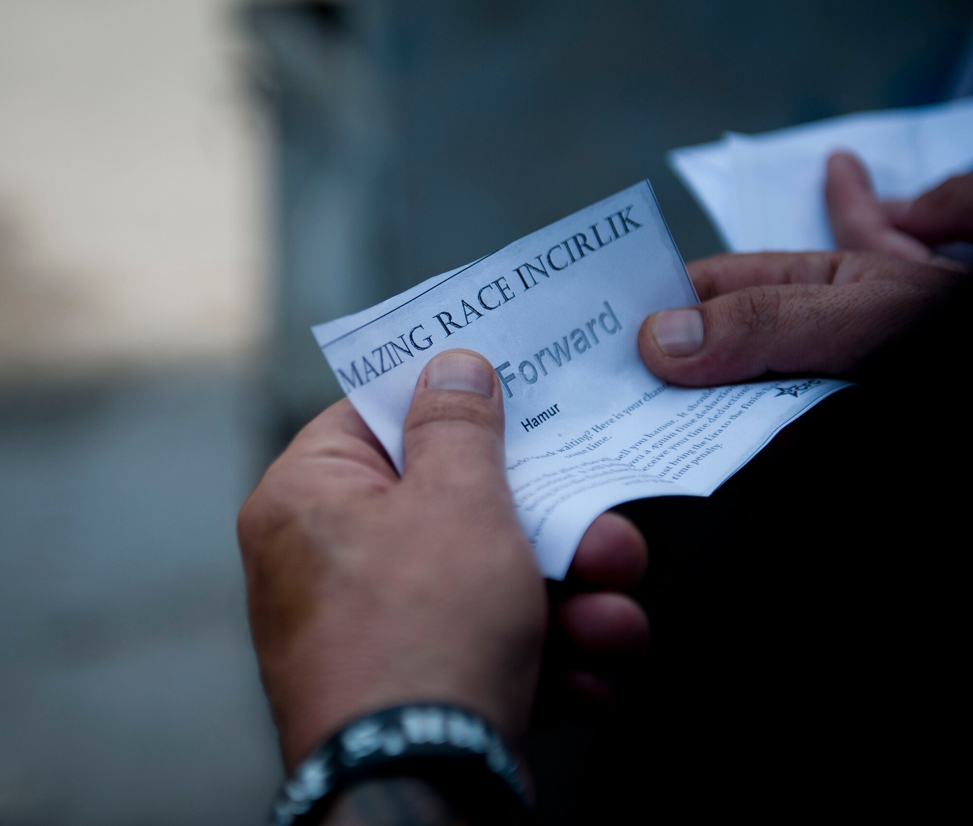 A team reads a clue during Incirlik's Amazing Race Sept. 22, at Incirlik Air Base, Turkey. Eight teams traveled across the base and into parts of Adana accomplishing various challenges while competing for first place. The event kicked off Incirlik's Combined Federal Campaign with all team fees going to charity. (U.S. Air Force photo by Senior Airman Clayton Lenhardt/Released)