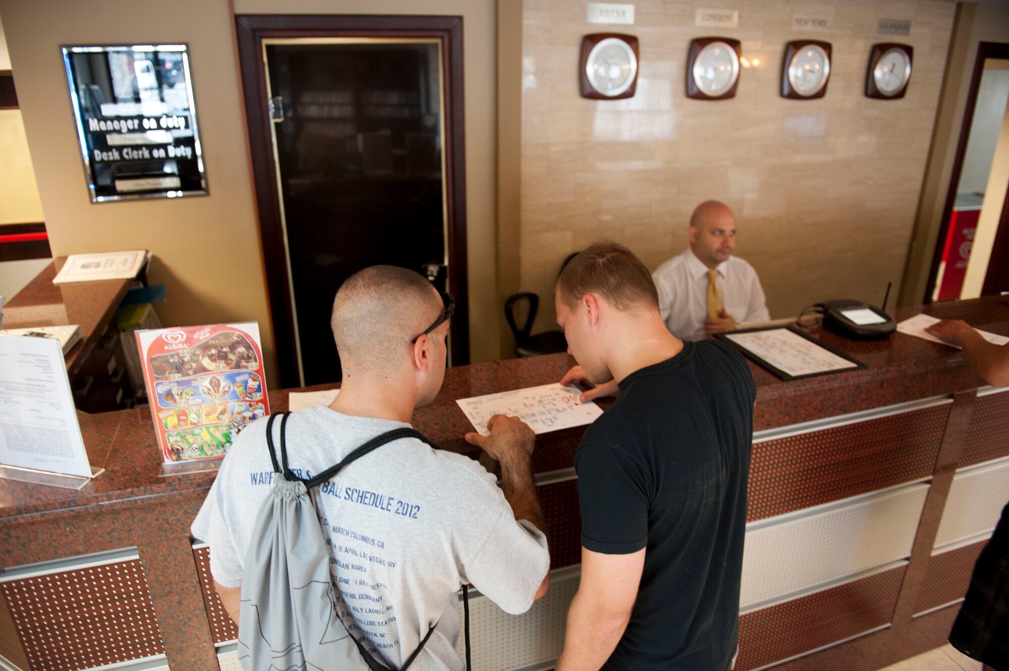 Senior Airmen Joshua Snyder, left, 39th Mission Support Group, and Devon Cross, 39th Comptroller Squadron, consult a map at the Hodja Inn during Incirlik's Amazing Race Sept. 22, 2012, at Incirlik Air Base, Turkey. Eight teams traveled across the base and into parts of Adana accomplishing various challenges while competing for first place. The event kicked off Incirlik's Combined Federal Campaign with all team fees going to charity. (U.S. Air Force photo by Senior Airman Clayton Lenhardt/Released)