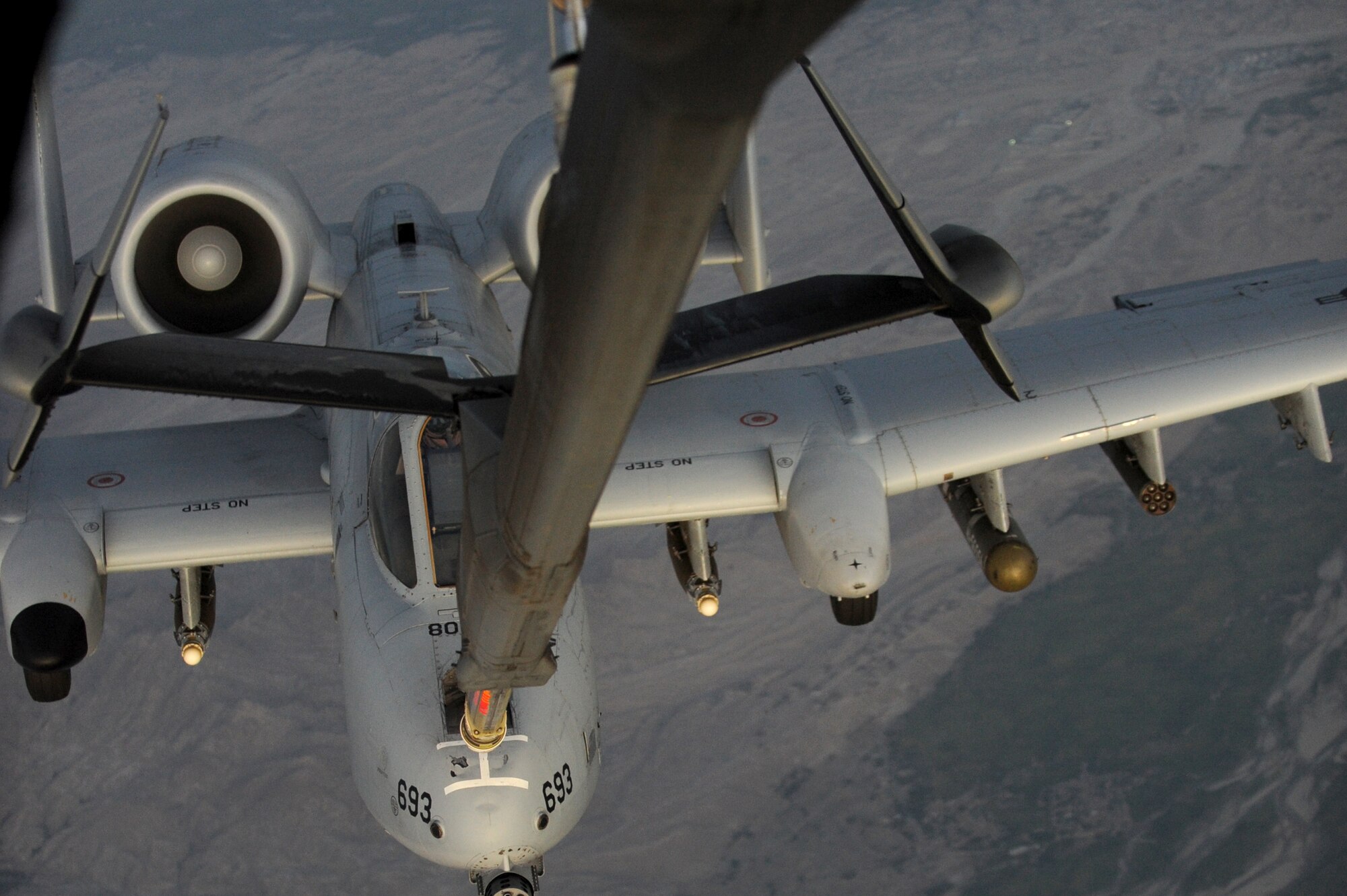 SOUTHWEST ASIA - An A-10 Warthog pulls up behind a KC-10 Extender to be refueled Sept. 18, 2012. The KC-10 is an advanced tanker and cargo aircraft designed to provide increased global mobility for U.S. armed forces. (U.S. Air Force photo/Master Sgt. Scott MacKay)