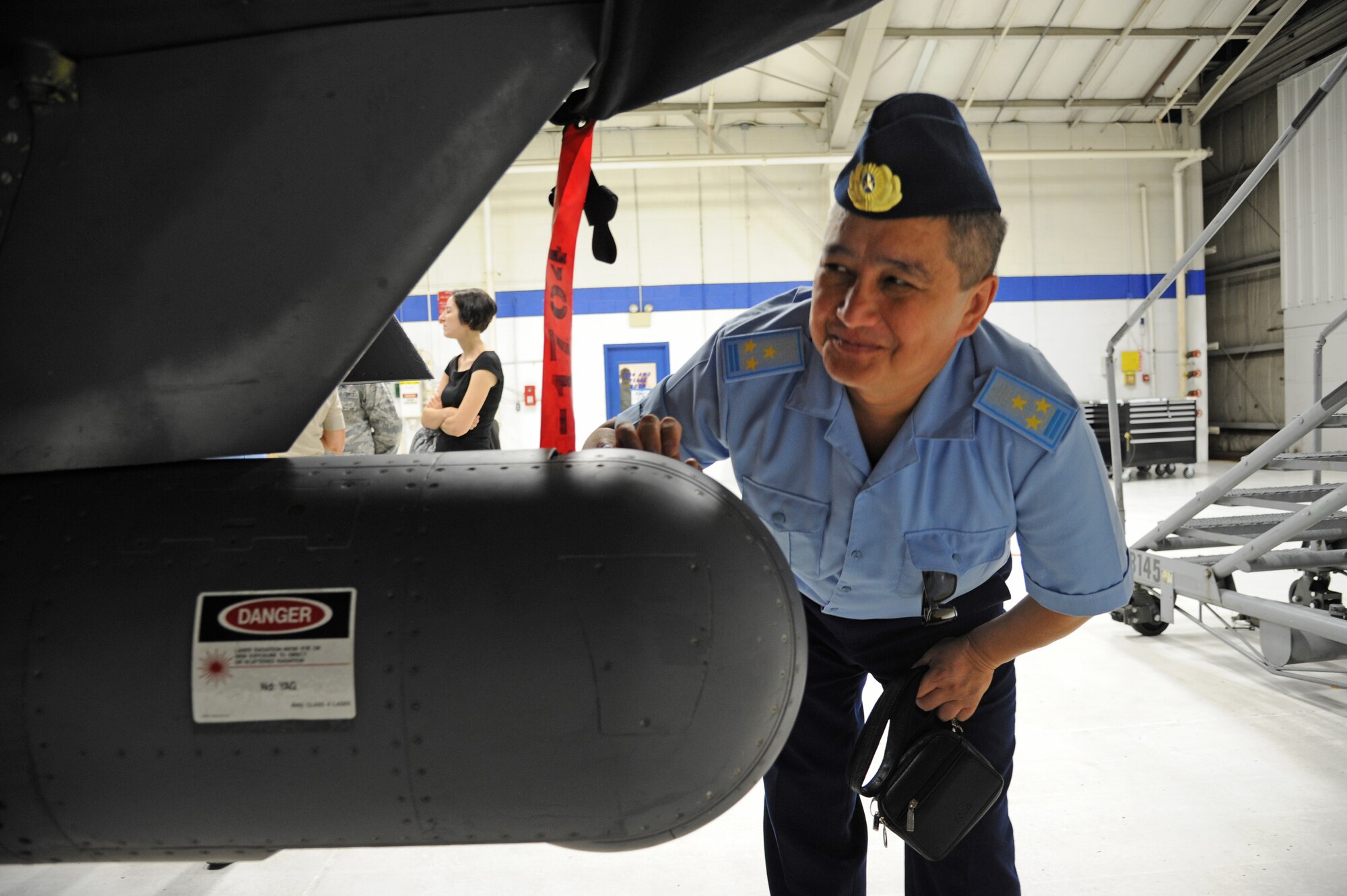 Kazakhstan Air Defense Force Col. Mirbek Kurmanaliyev inspects an F-15E Strike Eagle during a tour on Seymour Johnson Air Force Base, Sept. 20, 2012.  As part of a military-to- military program, the Kazakhs are visiting various active-duty fighter wings to learn about the Air Force’s flying safety standards and operations; ground, weapons and range safety; operational risk management, standardization and quality assurance.  (U.S. Air Force photo/Senior Airman Samantha Konieczny/Released)
